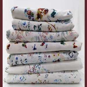 Polyurethane milk silk fabric knitted T-shirt fabric stretch jersey casual wear pajamas printed fabric manufacturer whol